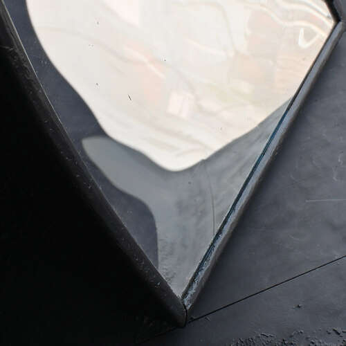 Distorted fairground mirror